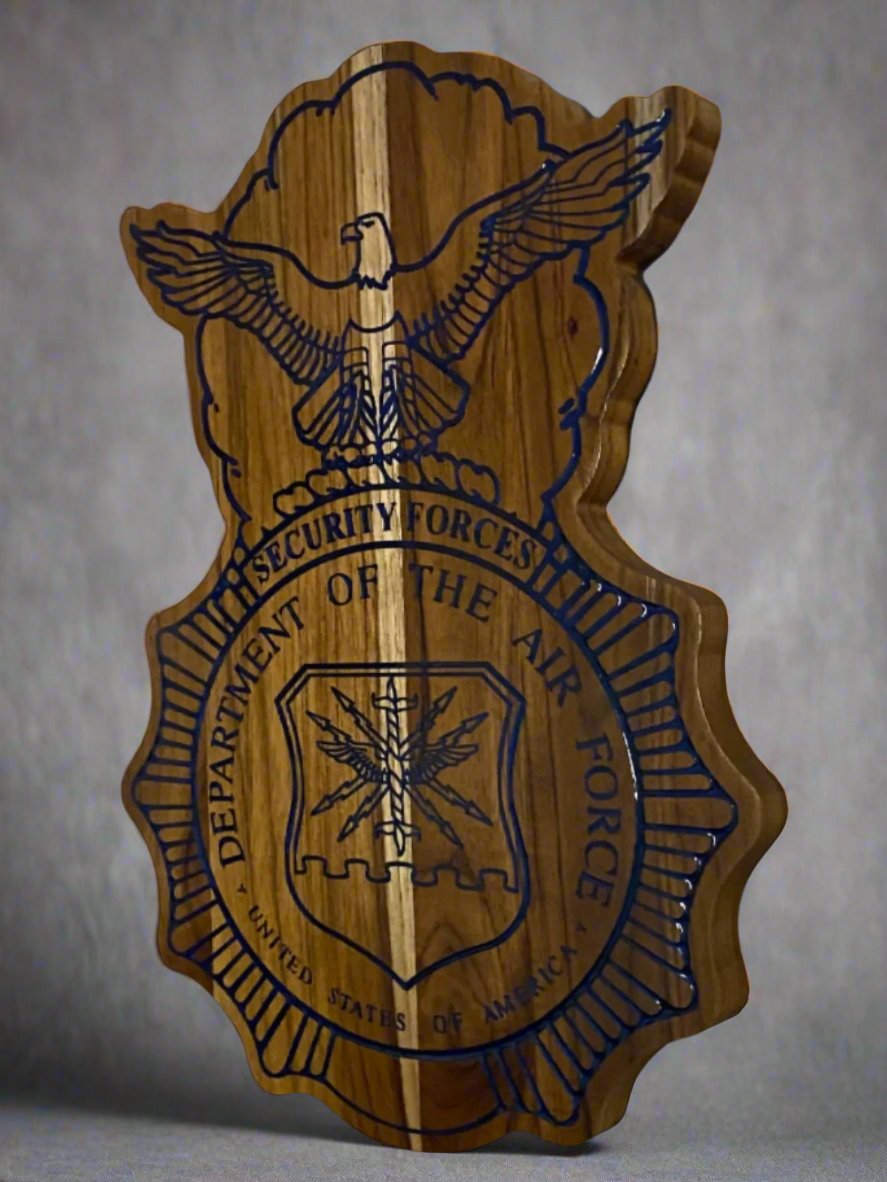 Teak Security Forces Plaque with a black background